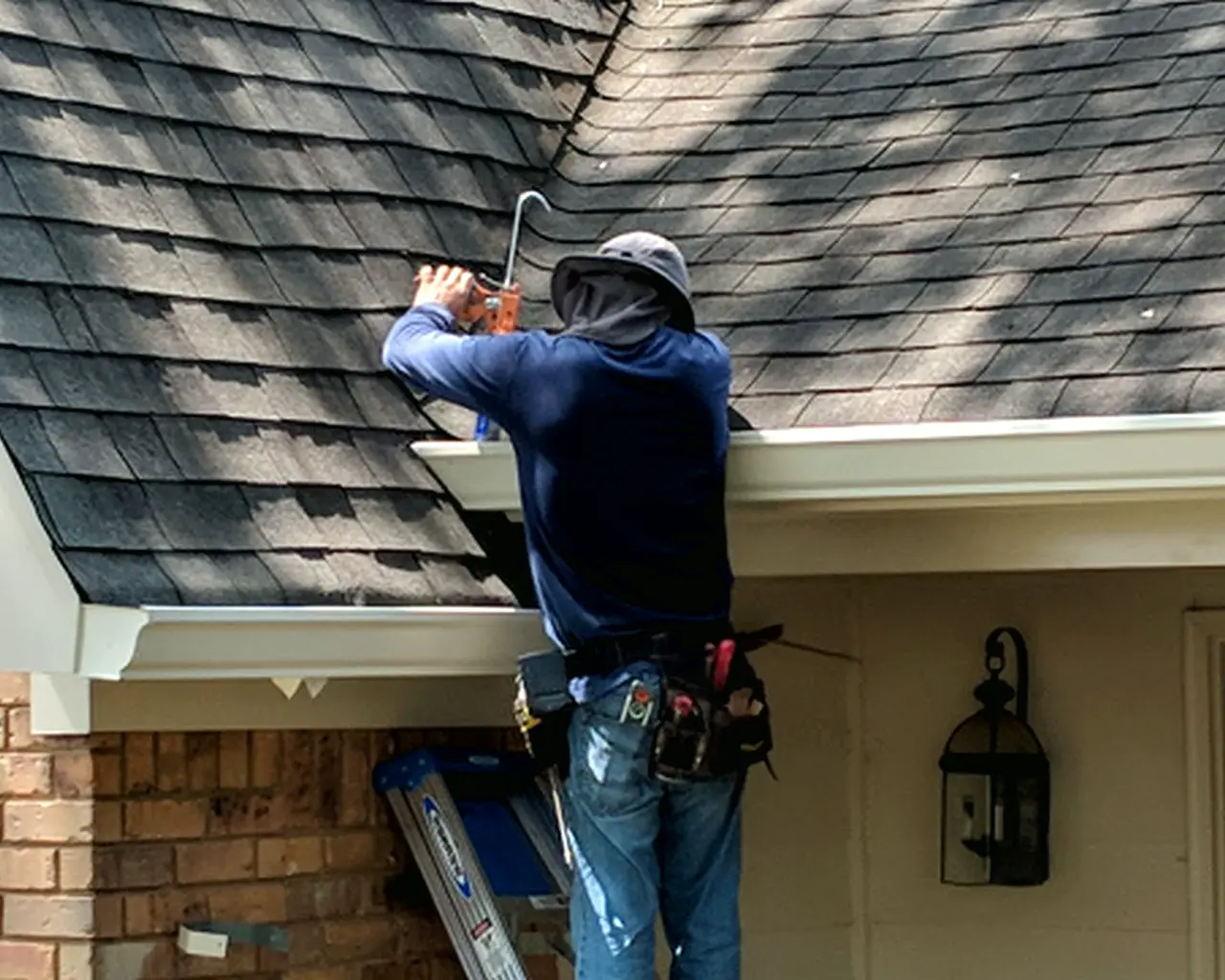 gutter-installation-bg Picture of Doyle installing gutter on a home in Yulee, FL